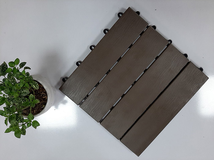 Wood plastic deck tiles