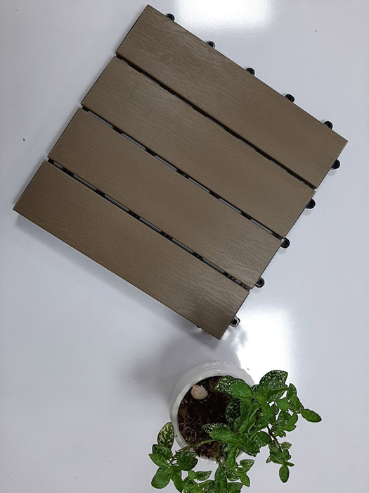 Wood plastic deck tiles