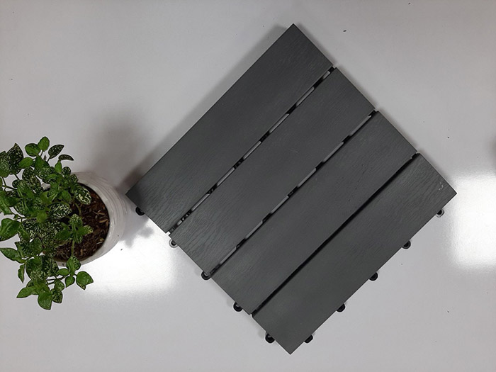 Wood plastic deck tiles