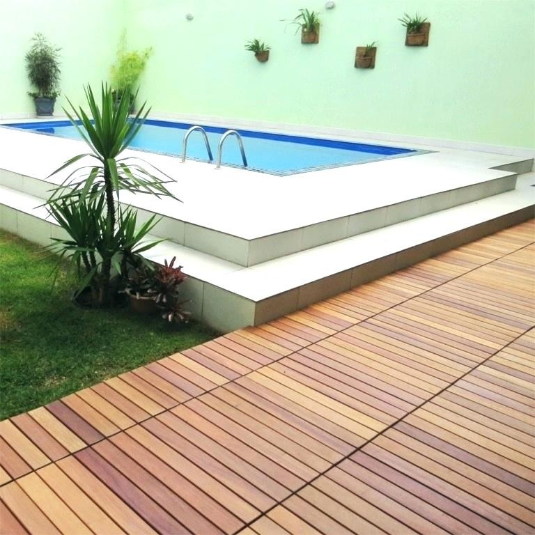Wood plastic deck tiles