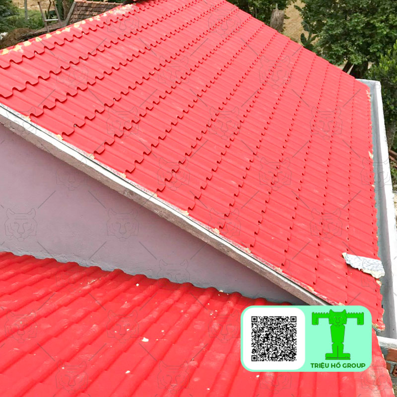 Insulated tile-profile roofing panel