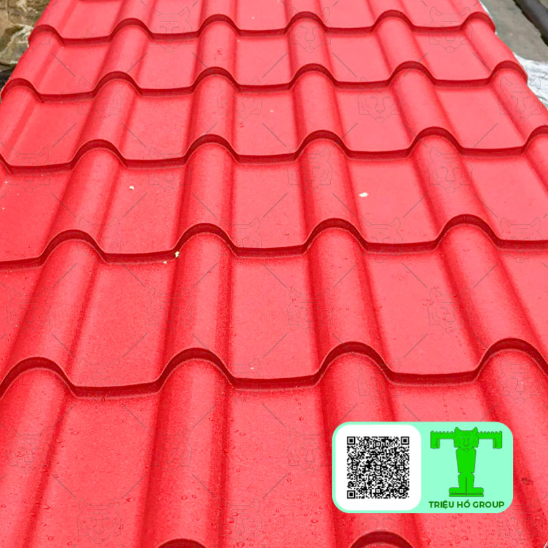 Insulated tile-profile roofing panel