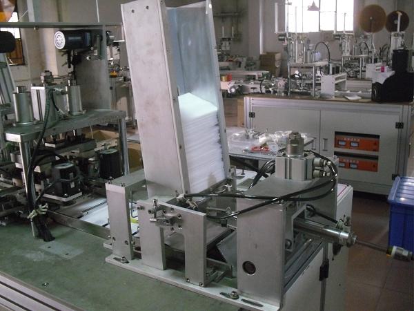 Auto ear loop welding machine