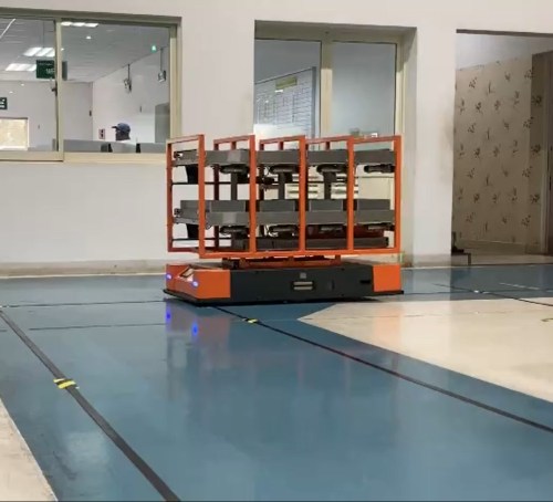 AGV vehicle with double-tier conveyor