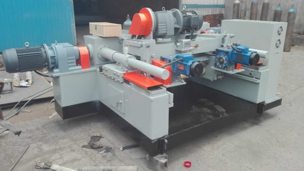 Veneer peeling machine