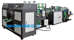 Machine for manufacturing plastic roll bags