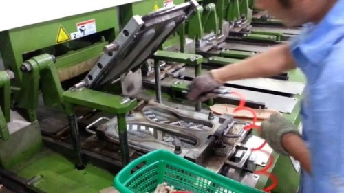 Non-stick coating for rubber shoe sole molds