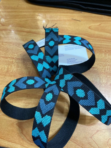 Patterned woven strap