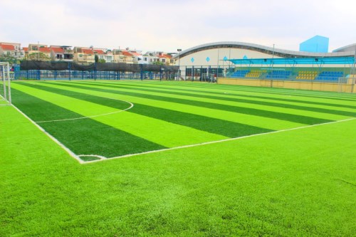 Artificial grass installation for football fields