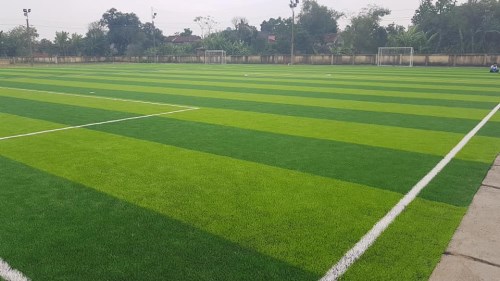 Artificial grass installation for football fields