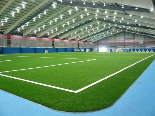 Artificial grass installation for football fields