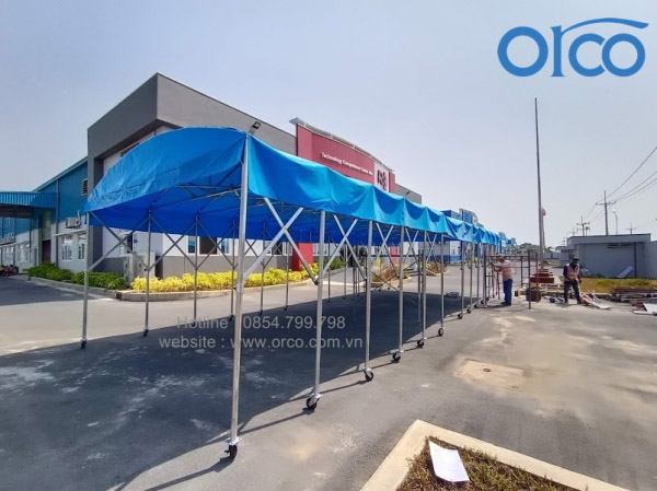 Mobile sliding canopy for vehicle parking