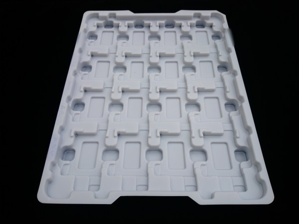 Plastic tray for storing electronic accessories