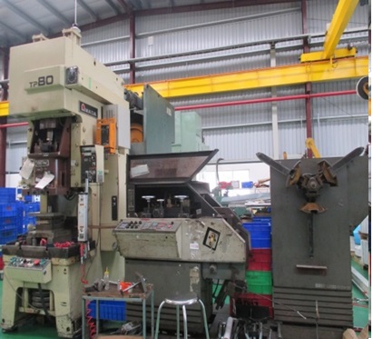 Progressive stamping press