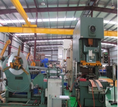 Progressive stamping press