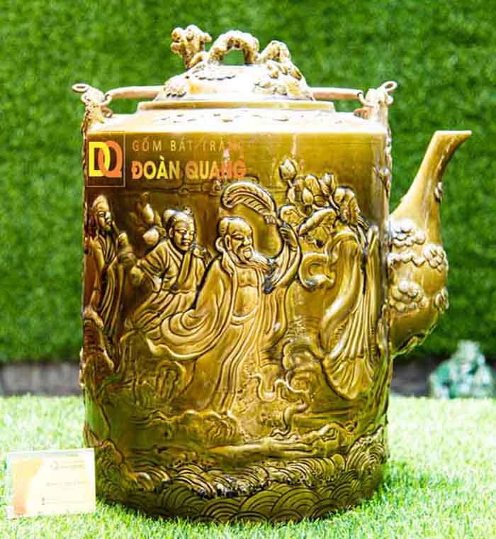 Teapot embossed hand claw