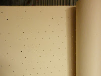 Perforated garment paper