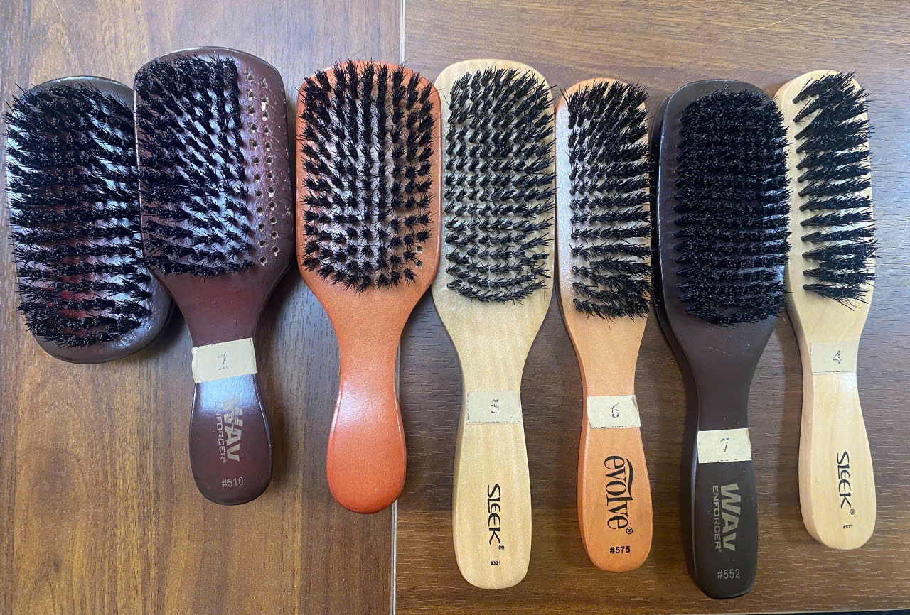 Handheld shoe brush
