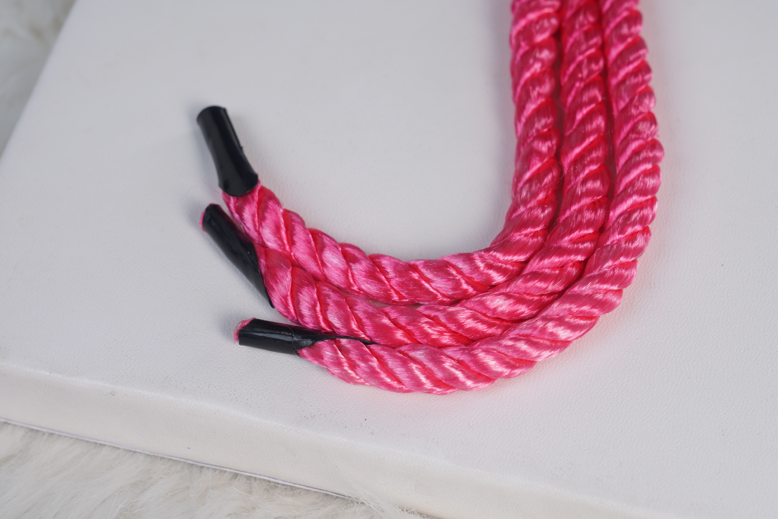 Twisted glossy silk strap
