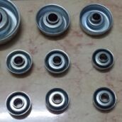 Conveyor roller bearing housings