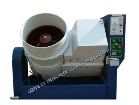Centrifugal disc finishing machine
