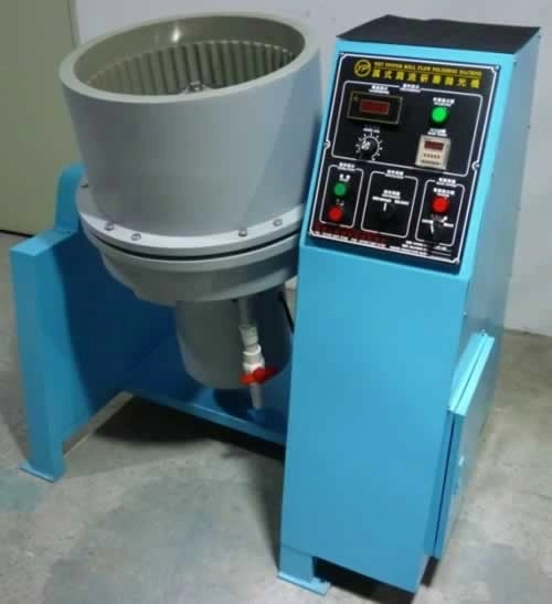 Automatic centrifugal disc finishing machine