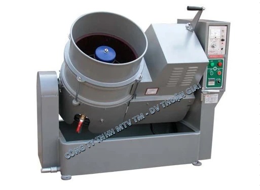 Centrifugal disc finishing machine