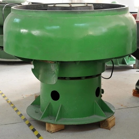 Curved bowl vibratory finishing machine