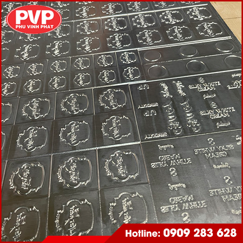 Embossed die cut mold