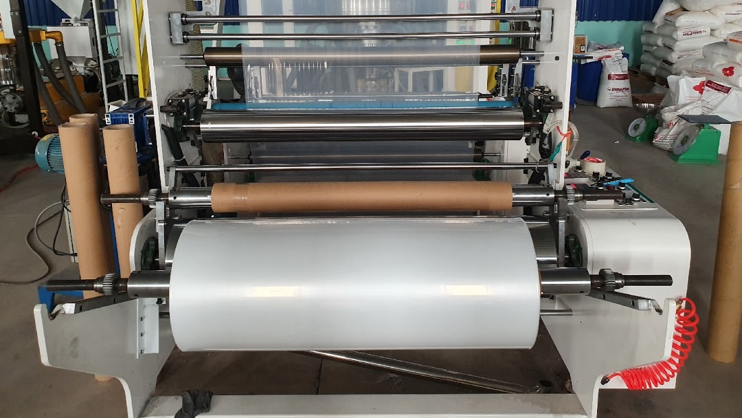 Plastic bag blowing machine