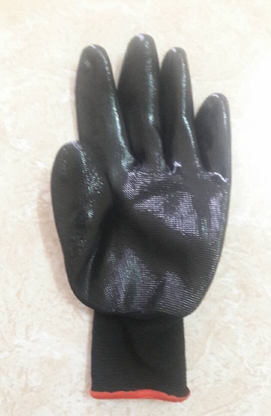 Black cotton gloves with plastic dots