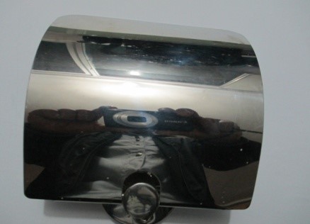 Toilet paper roll holder with cover