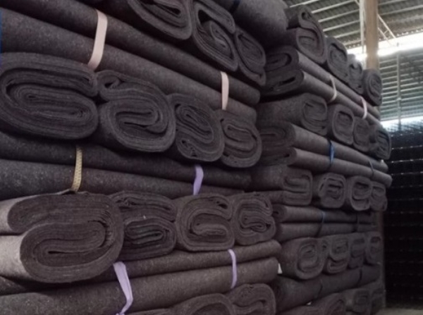 Needle punched nonwoven fabric for mattress lining