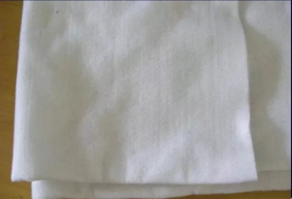 White needle punched nonwoven fabric