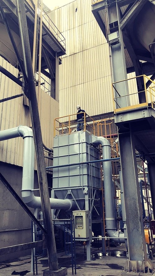 Fabric bag dust filtration system