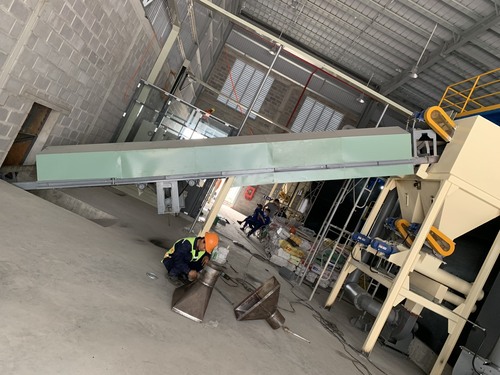 Rotary valve, screw conveyor, and belt conveyor