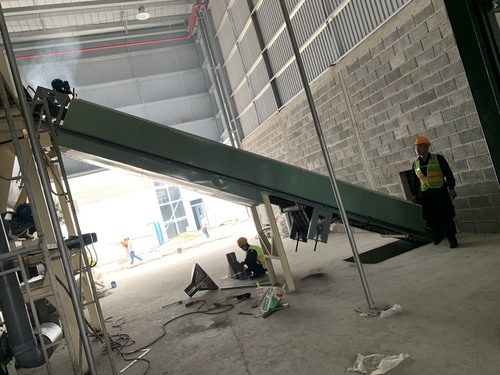 Rotary valve, screw conveyor, and belt conveyor