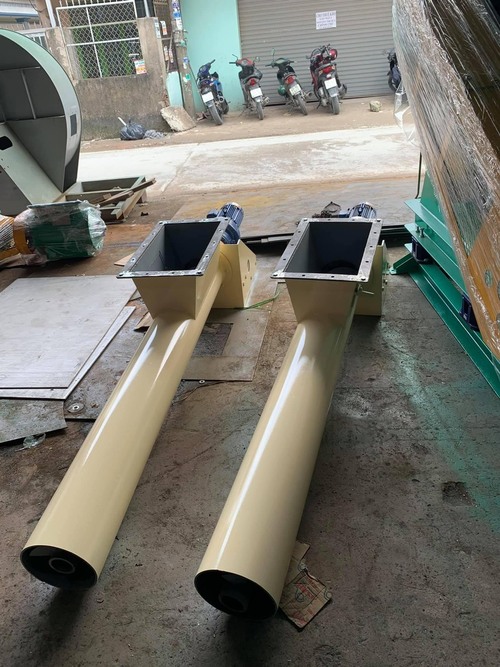 Rotary valve, screw conveyor, and belt conveyor