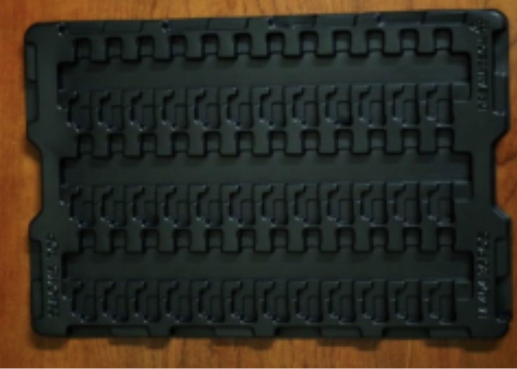 Profiled plastic tray