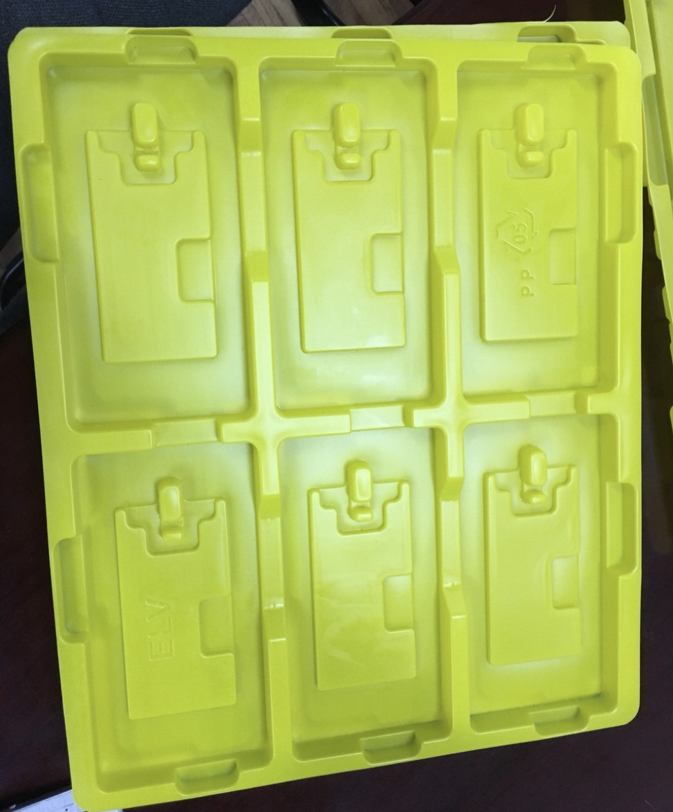 Profiled plastic tray