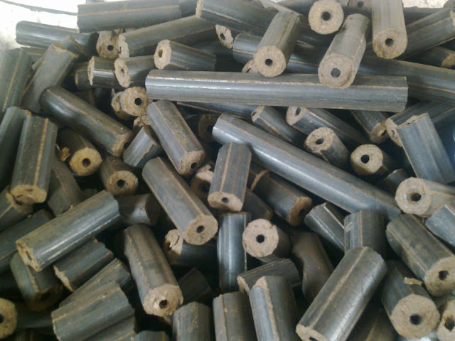 Pressed rice husk briquettes