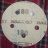 Round abrasive cloth with holes