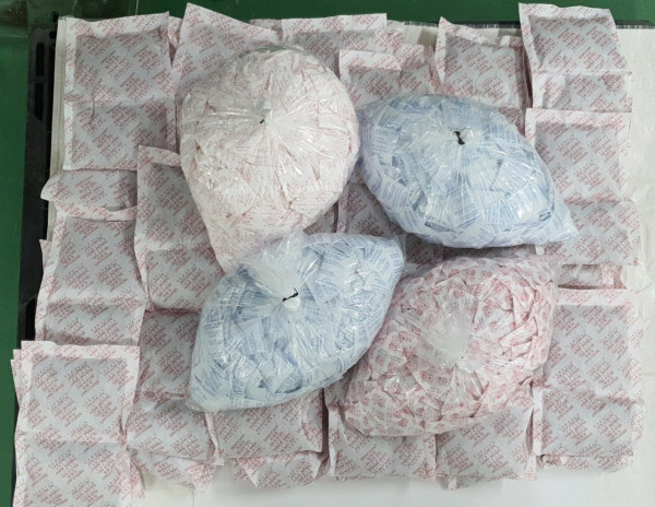 Moisture absorber packets