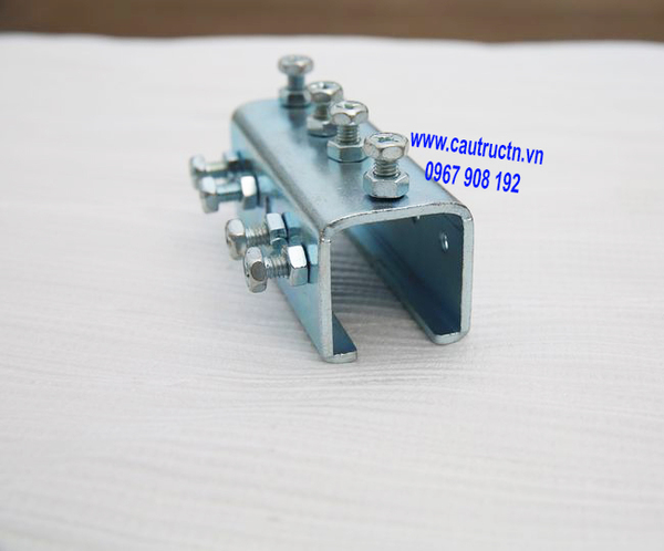 C-rail track coupler