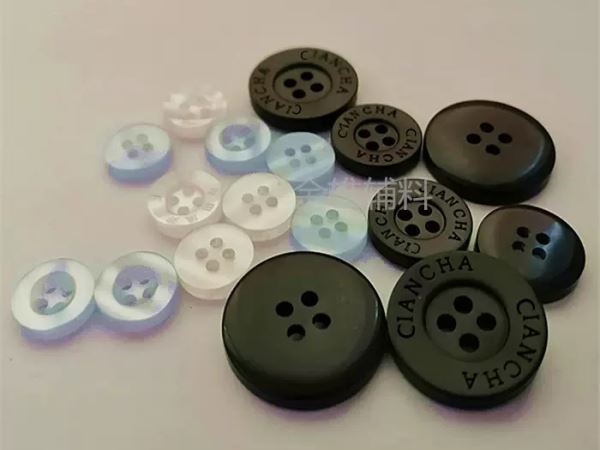 Engraved plastic button