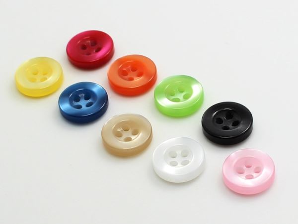 Patterned plastic buttons