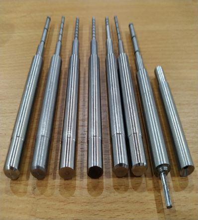 Aligning punch for rubber bar