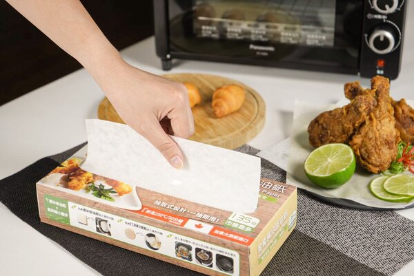 Oil absorbing cooking paper converting