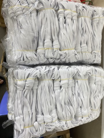 Woven button hole elastic band