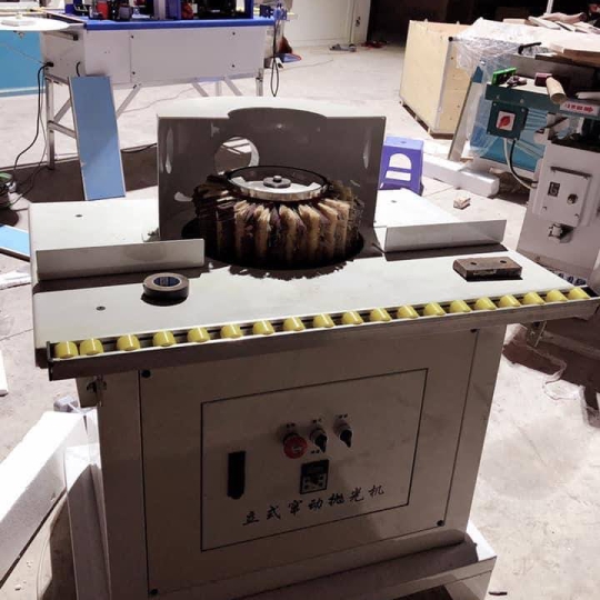 Vertical shaft brush sanding machine